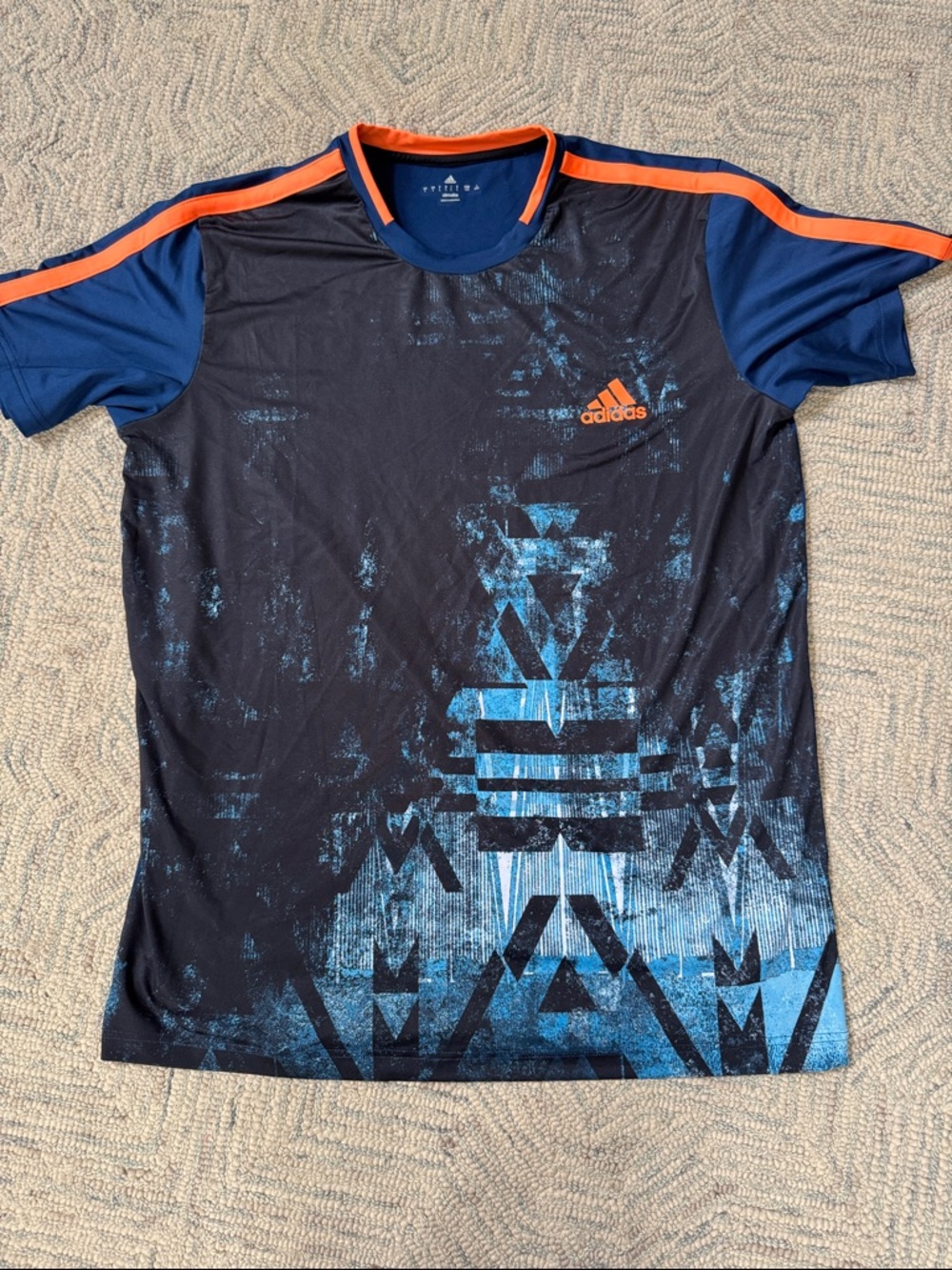 adidas Men’s black and Royal Blue Graphic Tee with Orange Accents
